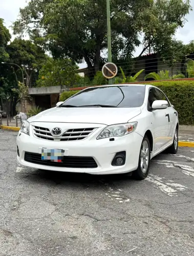 Toyota Corolla Gli 2013 — foto 2