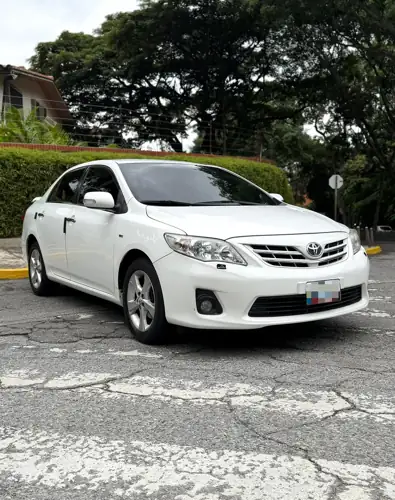 Toyota Corolla Gli 2013 — foto 4