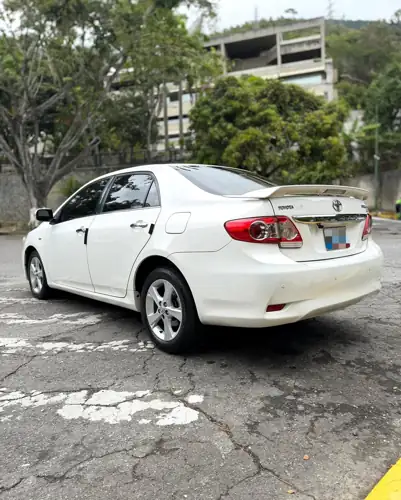 Toyota Corolla Gli 2013 — foto 5