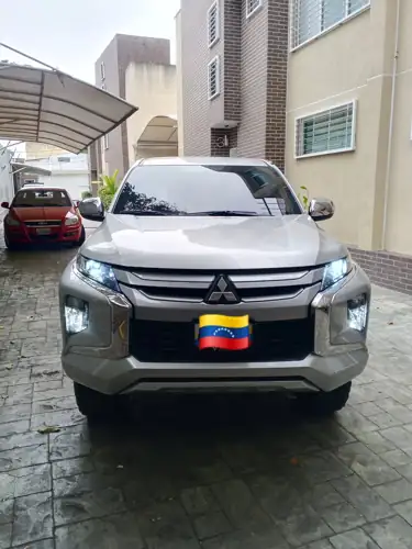 Mitsubishi L 2023 — foto 2