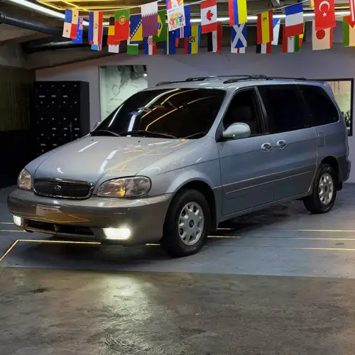 KIA Carnival 2002 — foto 2