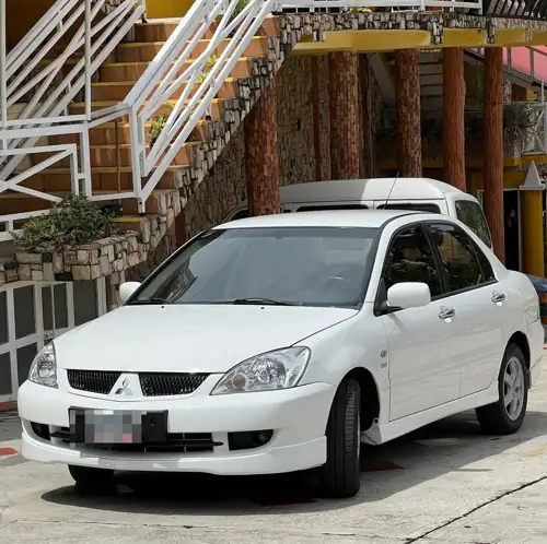 Mitsubishi Lancer Touring 2013 — foto 2